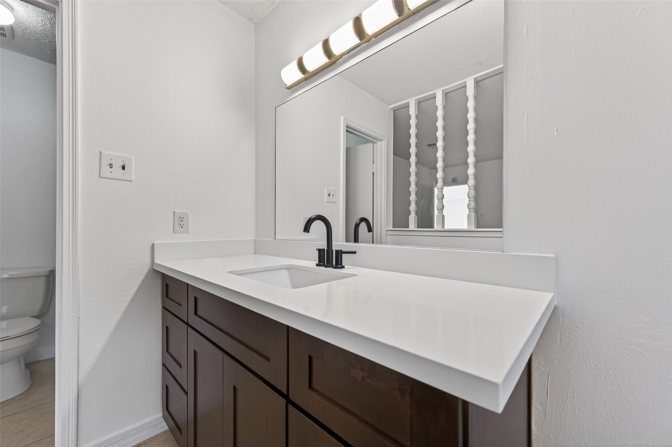 2603 Shady Bayou Lane Spring, TX 77373 - Photo 24 of 43 a bathroom with a sink and a mirror