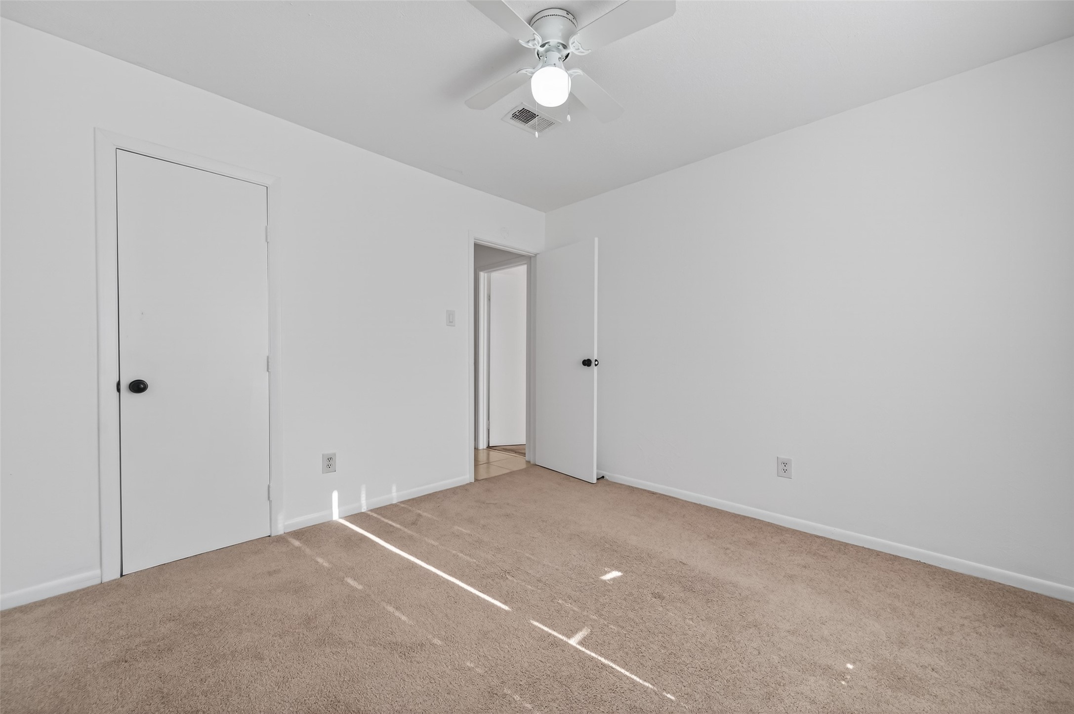 2603 Shady Bayou Lane Spring, TX 77373 - Photo 32 of 43 a view of an empty room with a ceiling fan