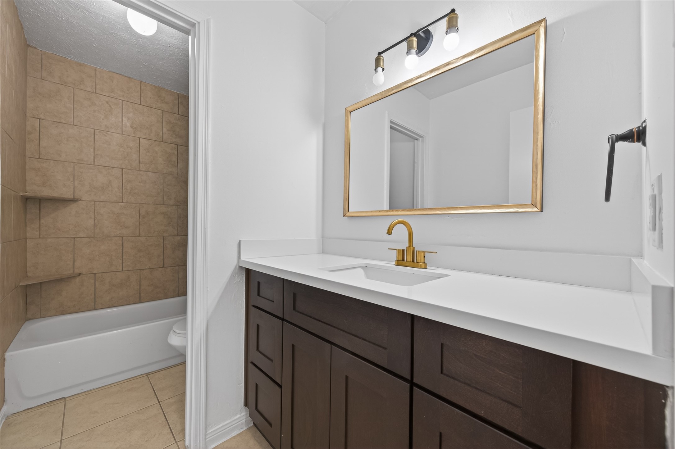 2603 Shady Bayou Lane Spring, TX 77373 - Photo 35 of 43 a bathroom with a sink and a mirror