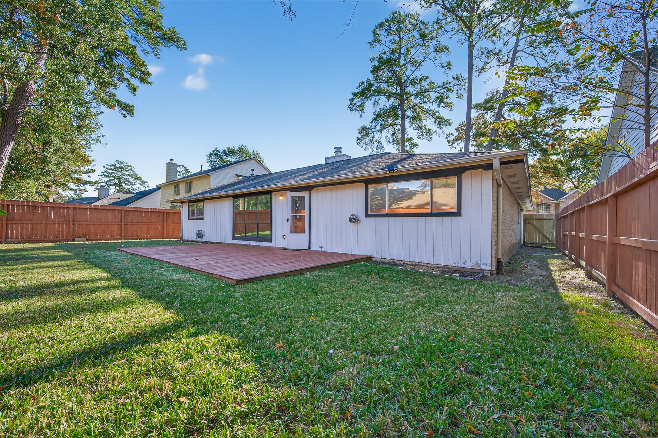 2603 Shady Bayou Lane Spring, TX 77373 - Photo 40 of 43 a backyard of a house with lots of green space