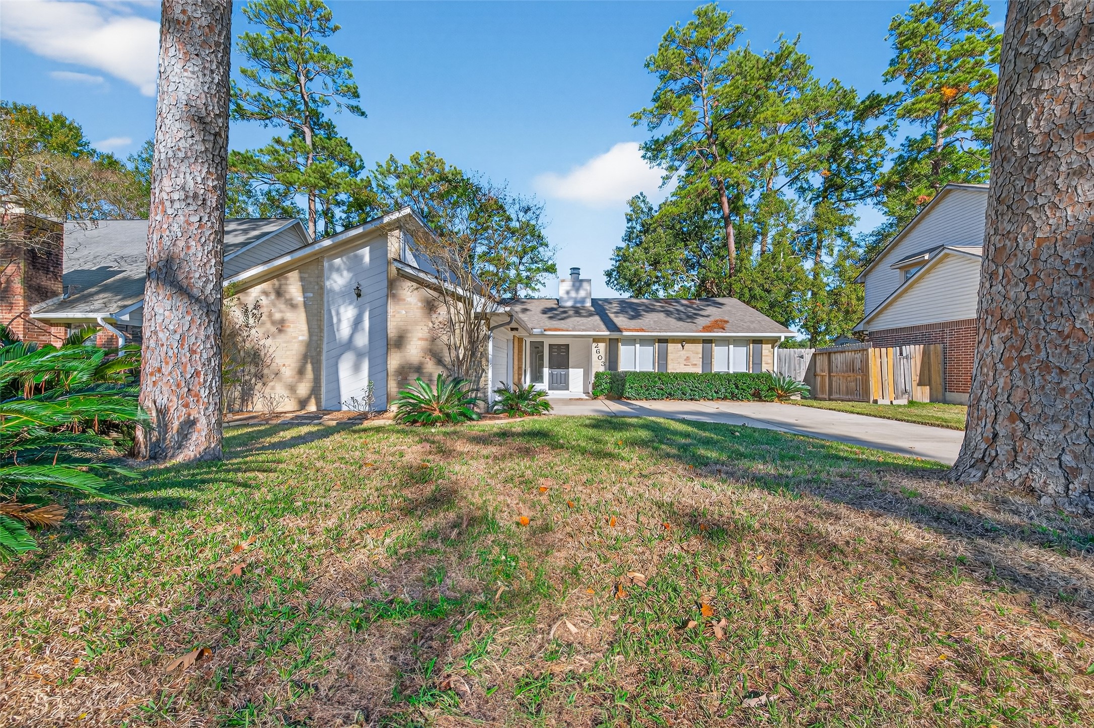 2603 Shady Bayou Lane Spring, TX 77373 - Photo 4 of 43 a front view of a house with garden