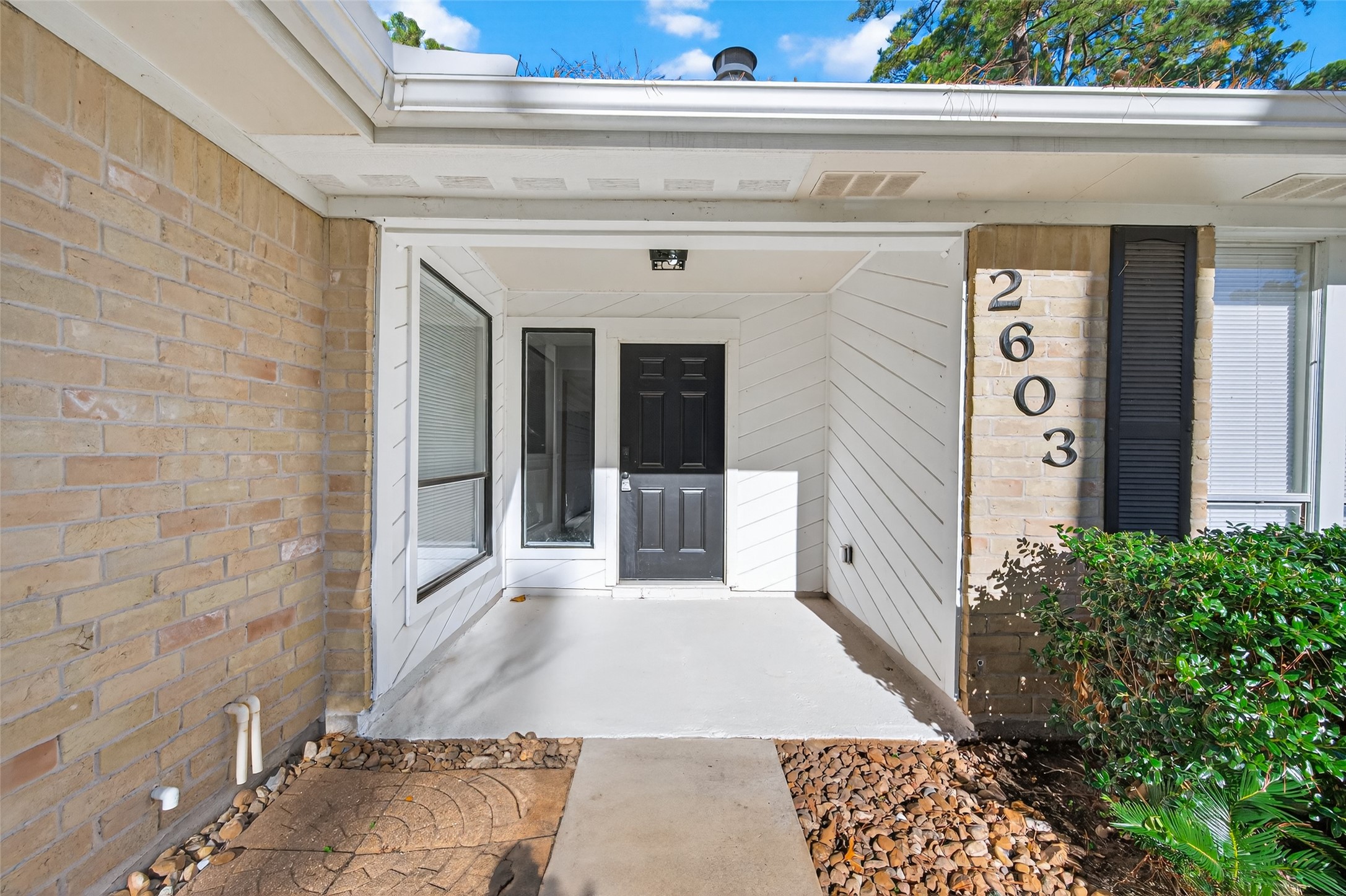 2603 Shady Bayou Lane Spring, TX 77373 - Photo 7 of 43 a view of a hallway with wooden floor and a potted plant