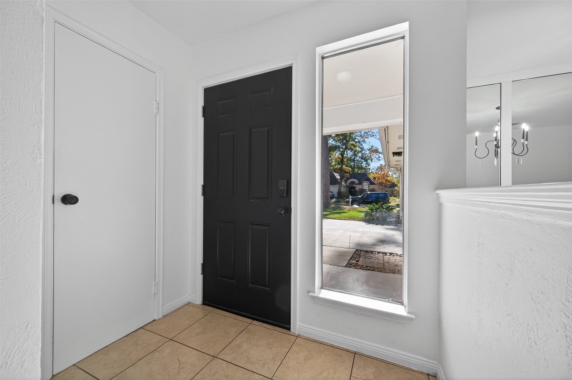 2603 Shady Bayou Lane Spring, TX 77373 - Photo 8 of 43 a view of hallway with bathroom and front door