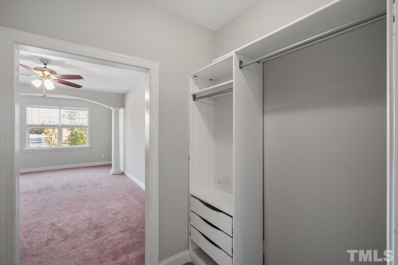 10421 Rosegate Court, Unit 201 Raleigh, NC 27617 - Photo 10 of 12 a view of an empty room with a window and a bathroom