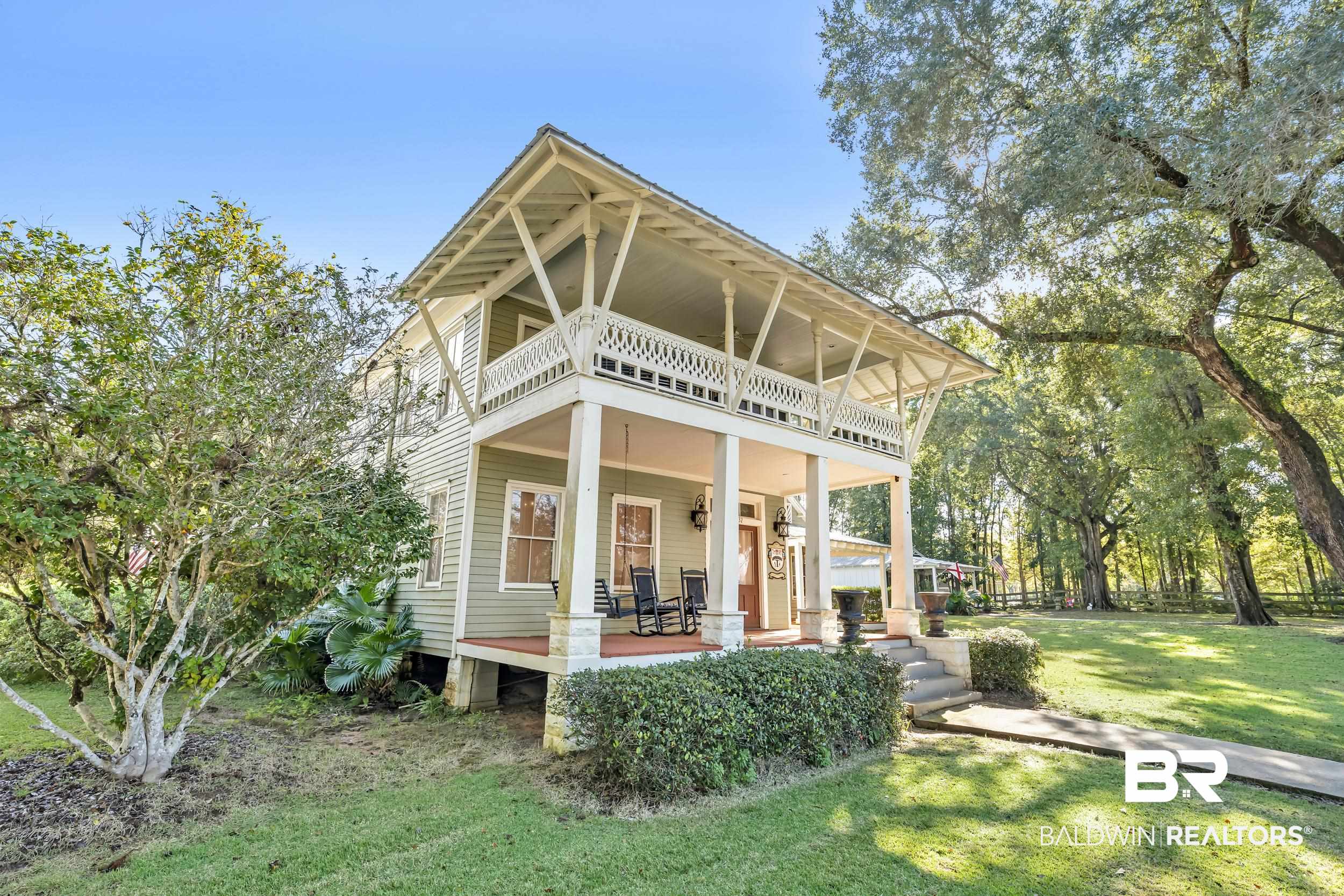 13232 Mary Ann Bch Road Fairhope, AL 36532 - Photo 73 of 79 View of front of home with a porch and a front yard