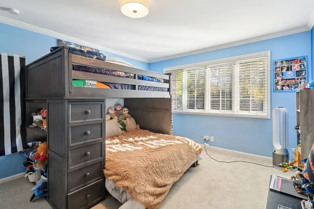 a bedroom with a bed and a cabinets