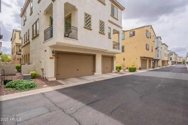a view of a building with a street
