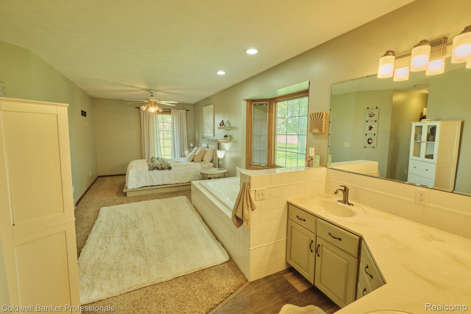 6464 Ferden Road Chesaning, MI 48616 - Photo 10 of 23 Bedroom with recessed lighting and a ceiling fan