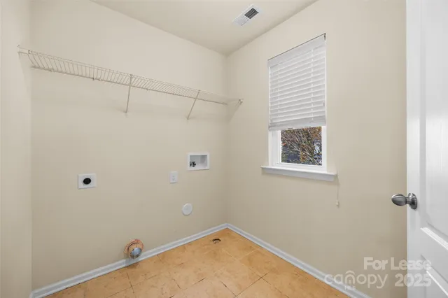 a view of a room with rack on the wall