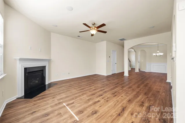 a bedroom with a bed and a fireplace