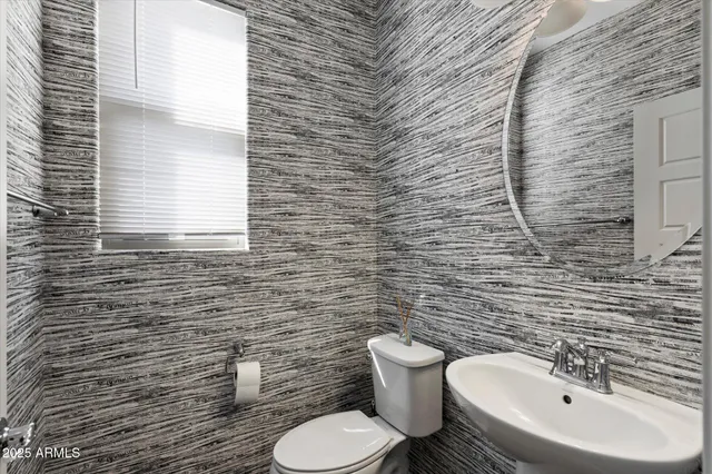 a bathroom with a sink and a toilet