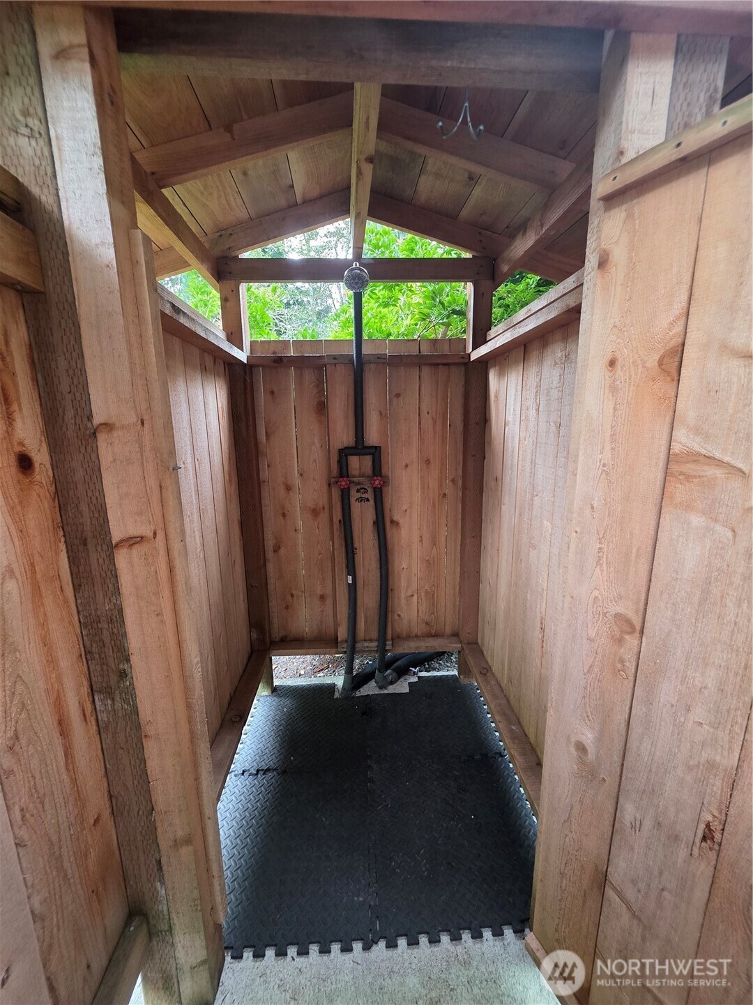 540 Nichols Road Clallam Bay, WA 98326 - Photo 19 of 25 a view of a porch with a sink