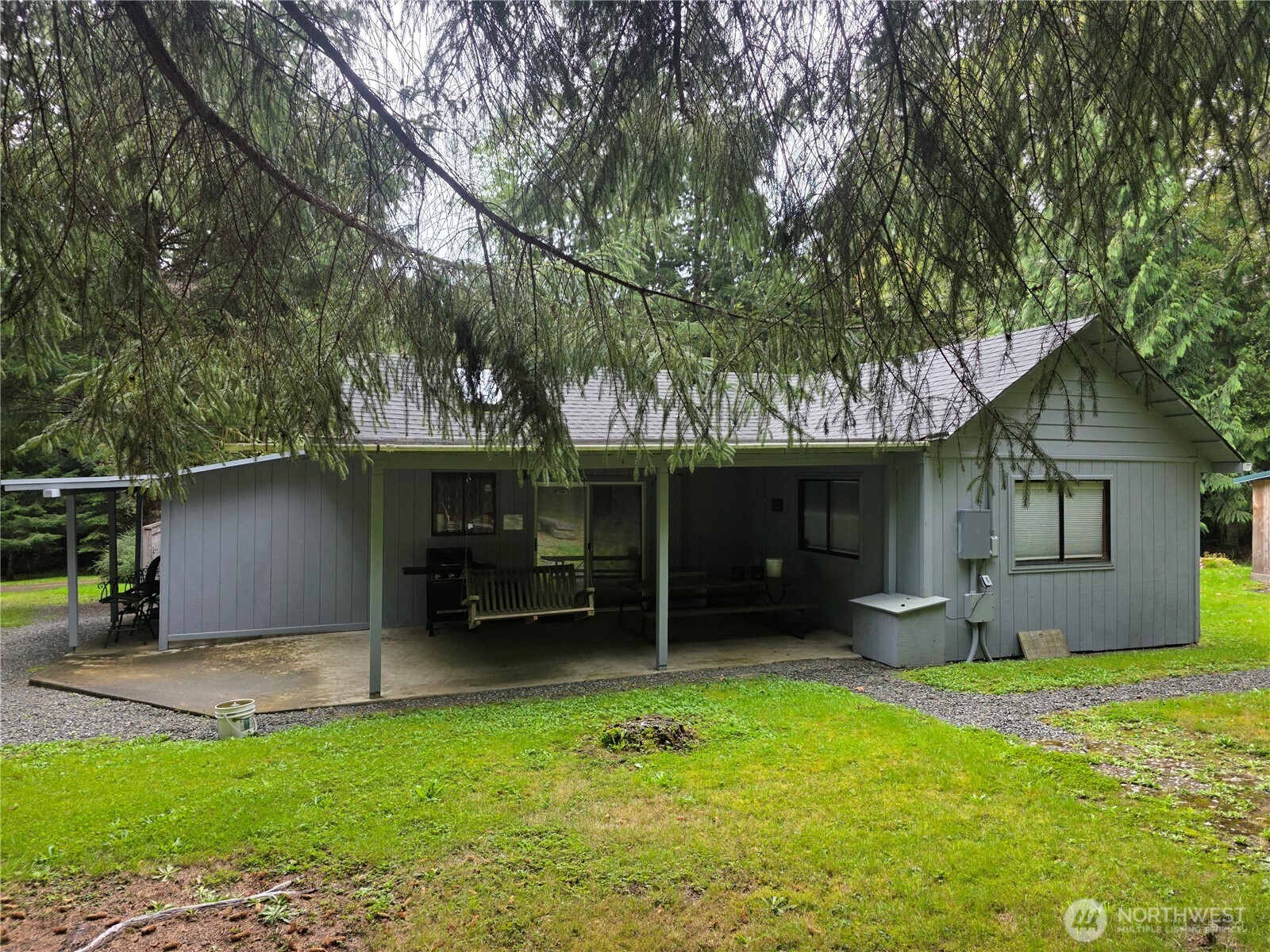 540 Nichols Road Clallam Bay, WA 98326 - Photo 25 of 25 front view of a house with a yard