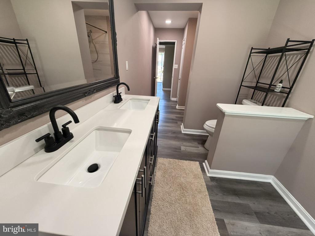 8 South Reed Street Bel Air, MD 21014 - Photo 19 of 23 Sleek dual-sink bathroom oasis.