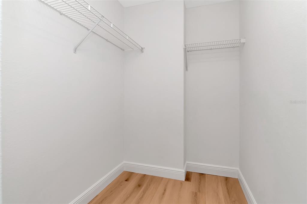 9500 Green Needle Drive New Port Richey, FL 34655 - Photo 12 of 28 a view of a room with wooden floor