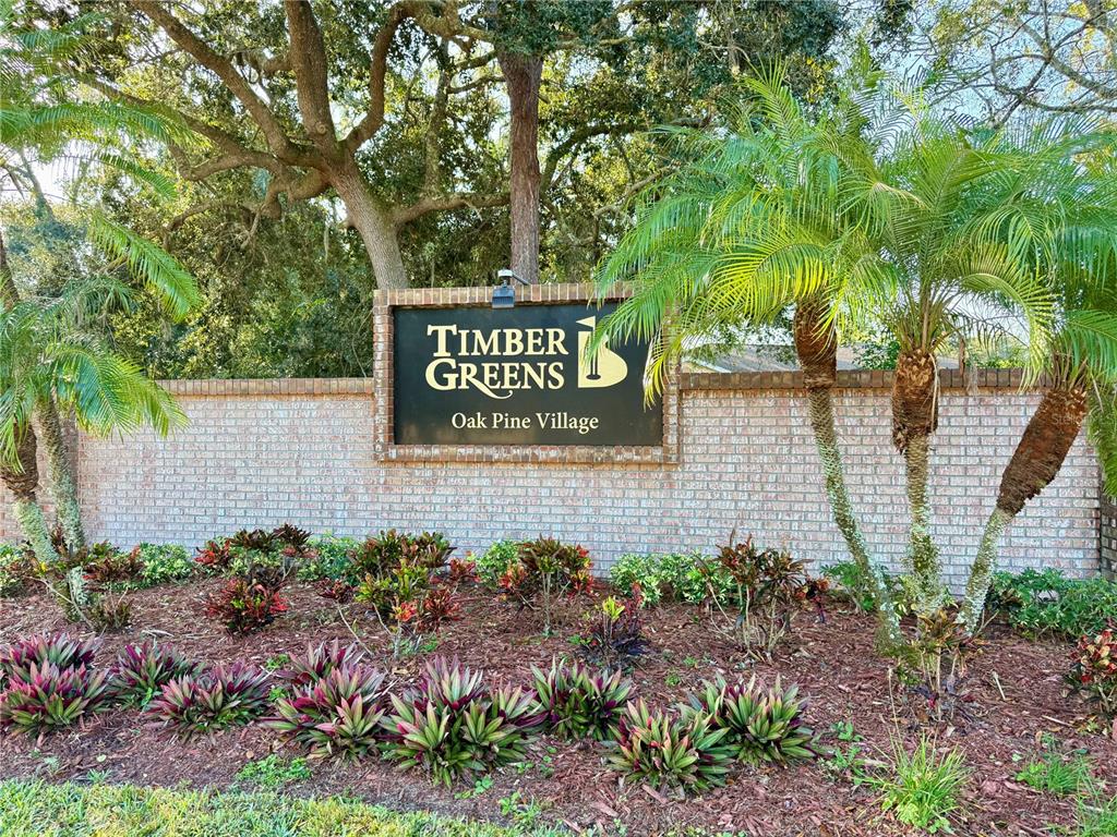 9500 Green Needle Drive New Port Richey, FL 34655 - Photo 21 of 28 a sign on the side of a road