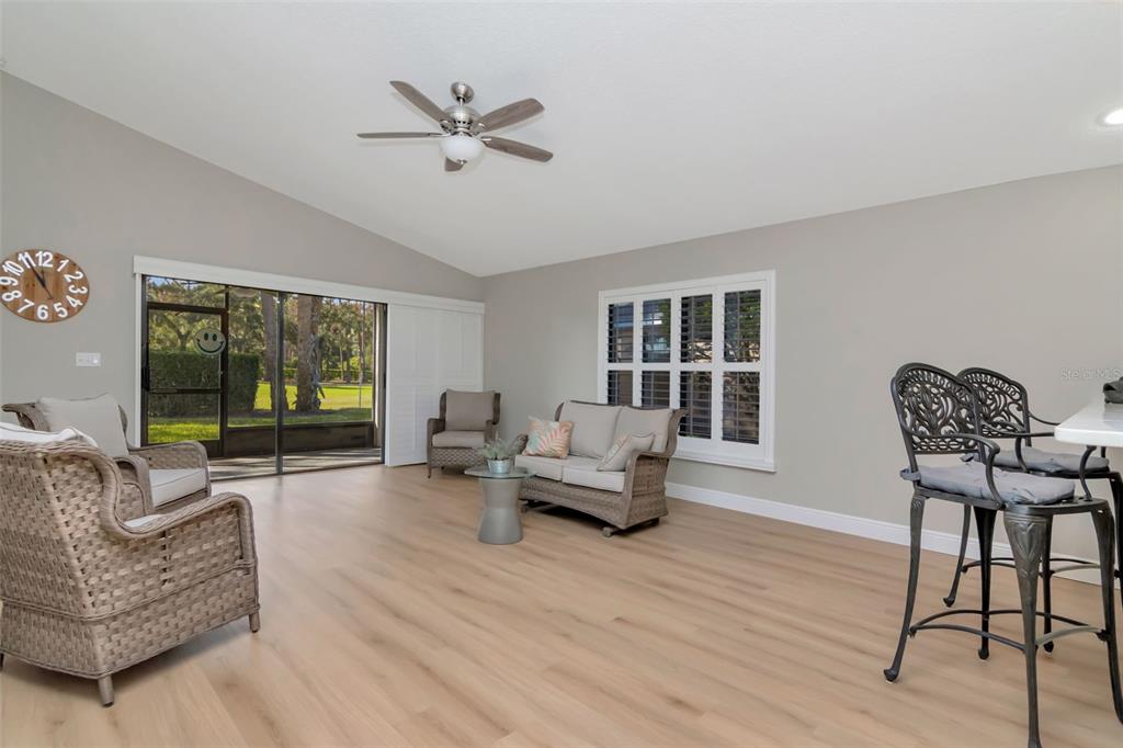 9500 Green Needle Drive New Port Richey, FL 34655 - Photo 6 of 28 a living room with furniture and a large window