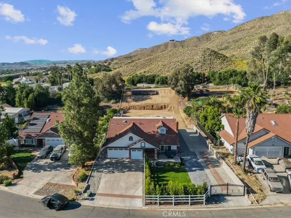 a house view with a garden space
