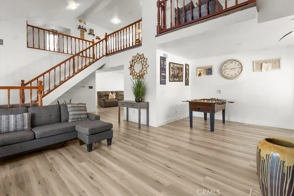a view of a livingroom with furniture and a fireplace