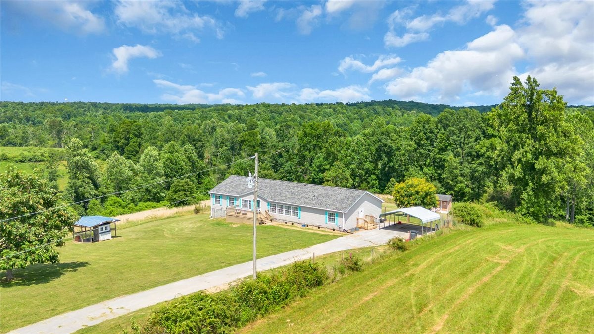2657 Oak Grove Road Red Boiling Springs, TN 37150 - Photo 2 of 45 a view of a yard with swimming pool