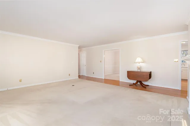 a living room with a rug