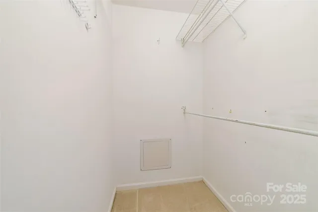 a view of a bedroom with windows