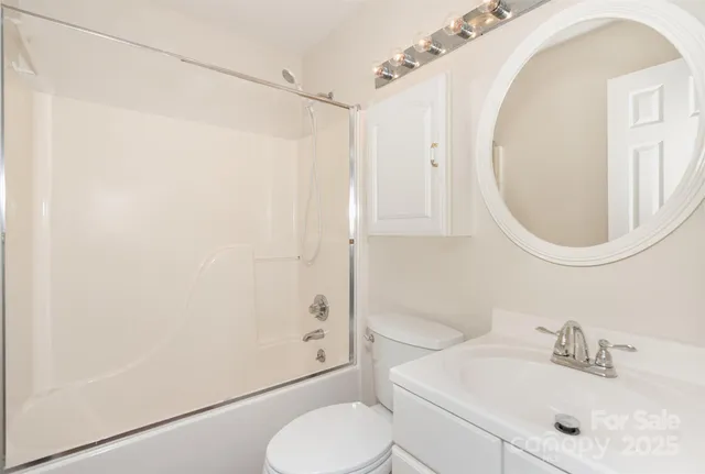 a black and white room with windows