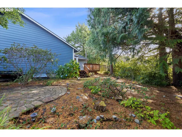 a backyard of a house with lots of green space