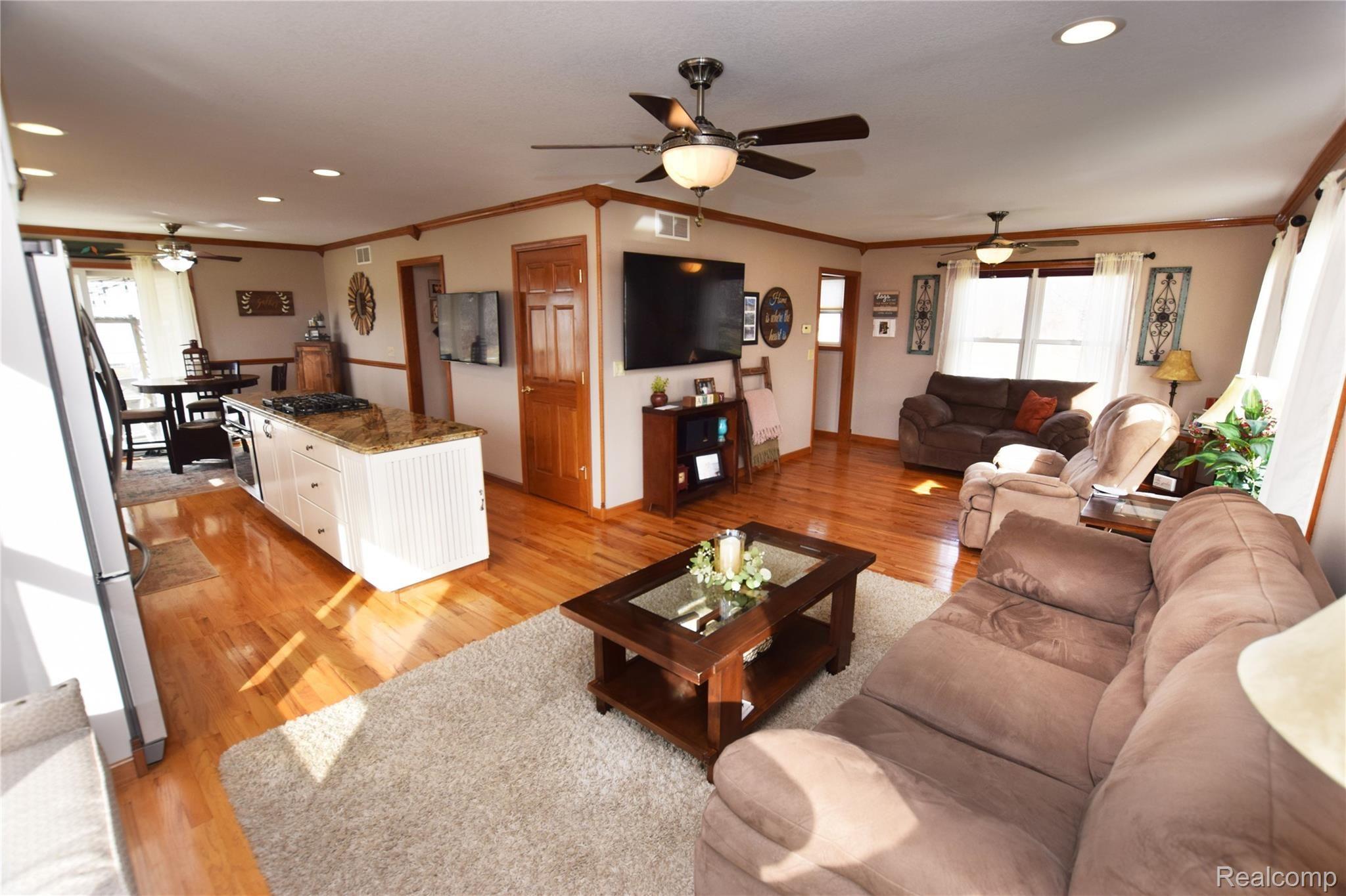 9247 Cook Road Gaines, MI 48436 - Photo 5 of 25 Living Room and Kitchen