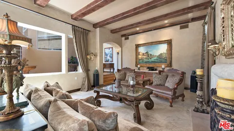 a kitchen that has a lot of cabinets in it