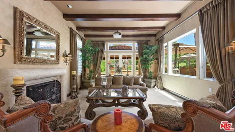 a view of a swimming pool with a garden and plants