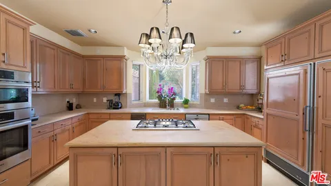 a front view of a building with garden