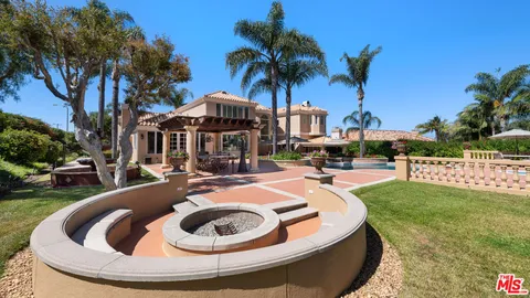 a bathroom with a sink and a large mirror