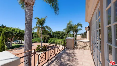 a view of a bathroom sink and a mirror