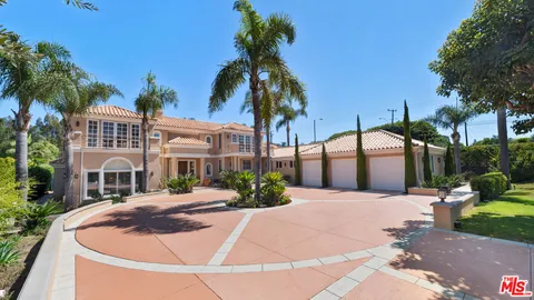 a living room with furniture fireplace and a flat screen tv