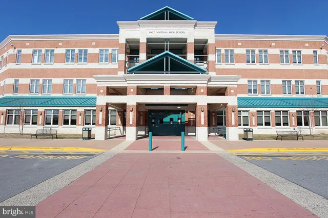 a view of a house with a yard porch and sitting area