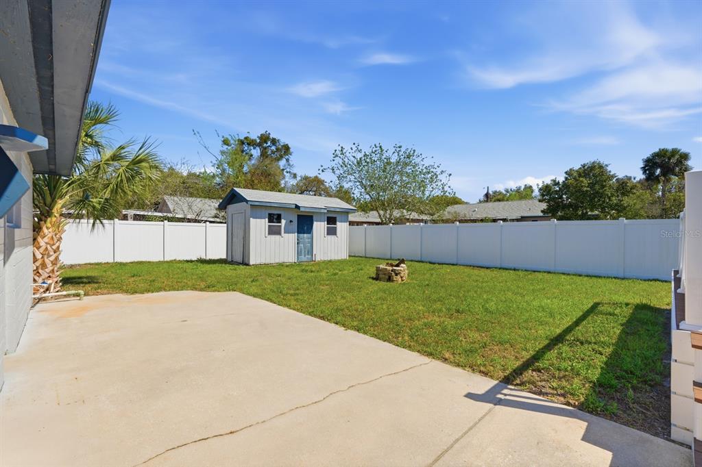 231 North Ridgewood Avenue Ormond Beach, FL 32174 - Photo 34 of 52 a view of outdoor space yard and garage