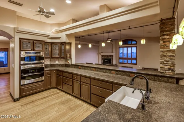 a view of a swimming pool with a patio