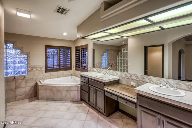 a view of a two chairs in the roof deck