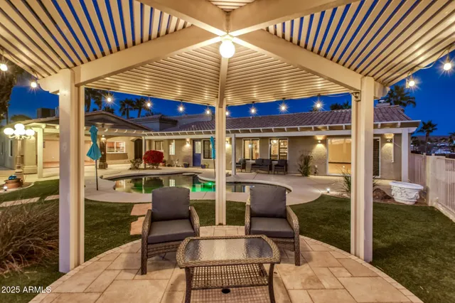 a kitchen with stainless steel appliances granite countertop a stove a refrigerator and a microwave