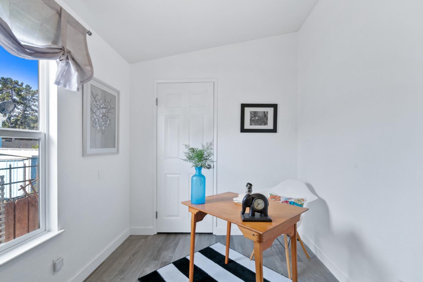 100 North Rodeo Gulch Road, Unit 65 Soquel, CA 95073 - Photo 18 of 33 a view of a workspace with furniture and wooden floor