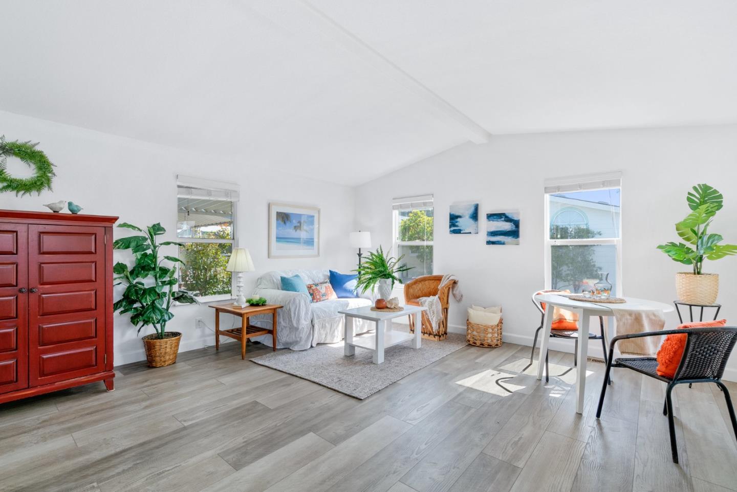 100 North Rodeo Gulch Road, Unit 65 Soquel, CA 95073 - Photo 3 of 33 a living room with furniture and a potted plant
