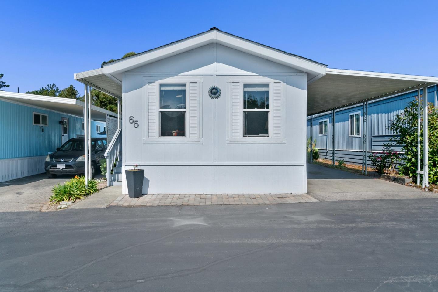 100 North Rodeo Gulch Road, Unit 65 Soquel, CA 95073 - Photo 31 of 33 a front view of a house with a yard