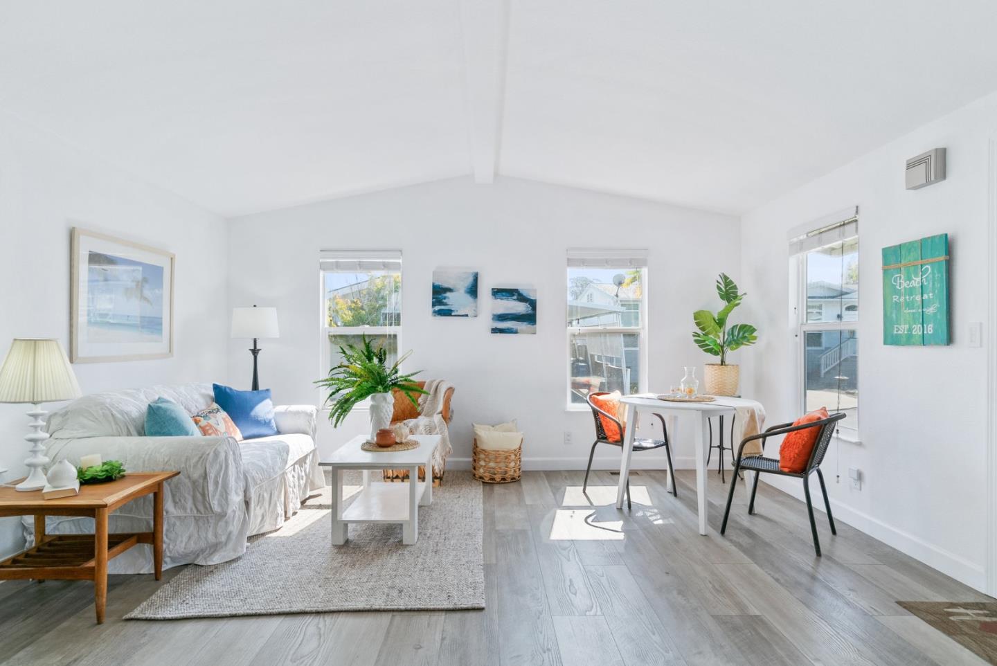 100 North Rodeo Gulch Road, Unit 65 Soquel, CA 95073 - Photo 4 of 33 a living room with furniture and wooden floor