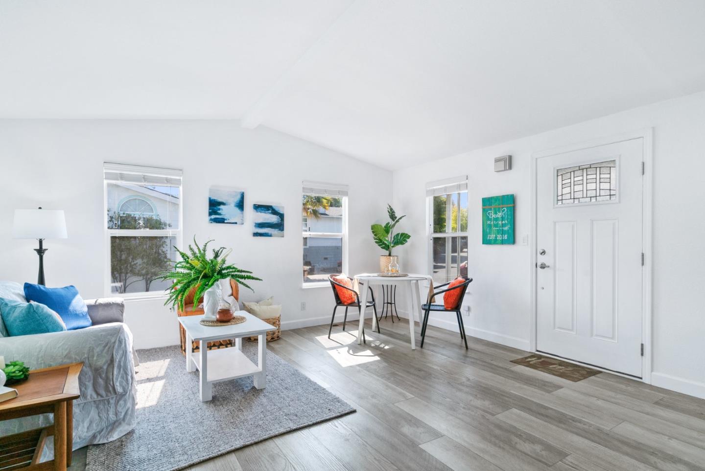100 North Rodeo Gulch Road, Unit 65 Soquel, CA 95073 - Photo 5 of 33 a living room with furniture and wooden floor
