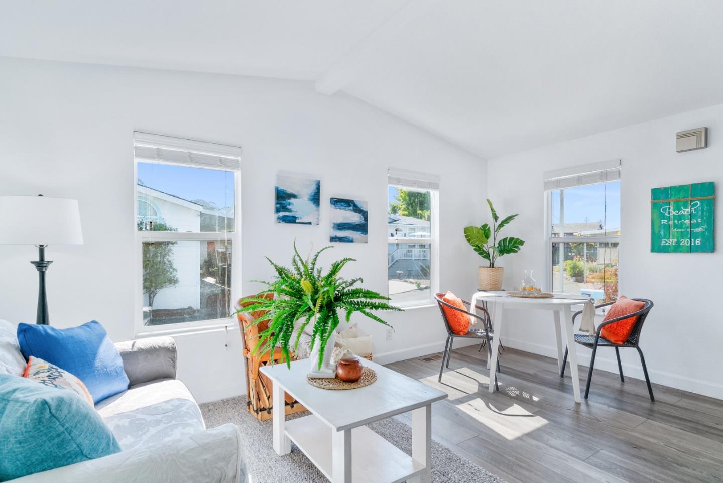 100 North Rodeo Gulch Road, Unit 65 Soquel, CA 95073 - Photo 6 of 33 a living room with furniture and a potted plant