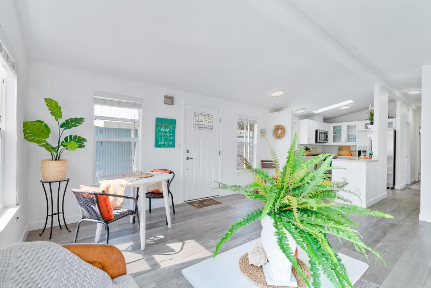 100 North Rodeo Gulch Road, Unit 65 Soquel, CA 95073 - Photo 9 of 33 a living room with furniture potted plant and a window
