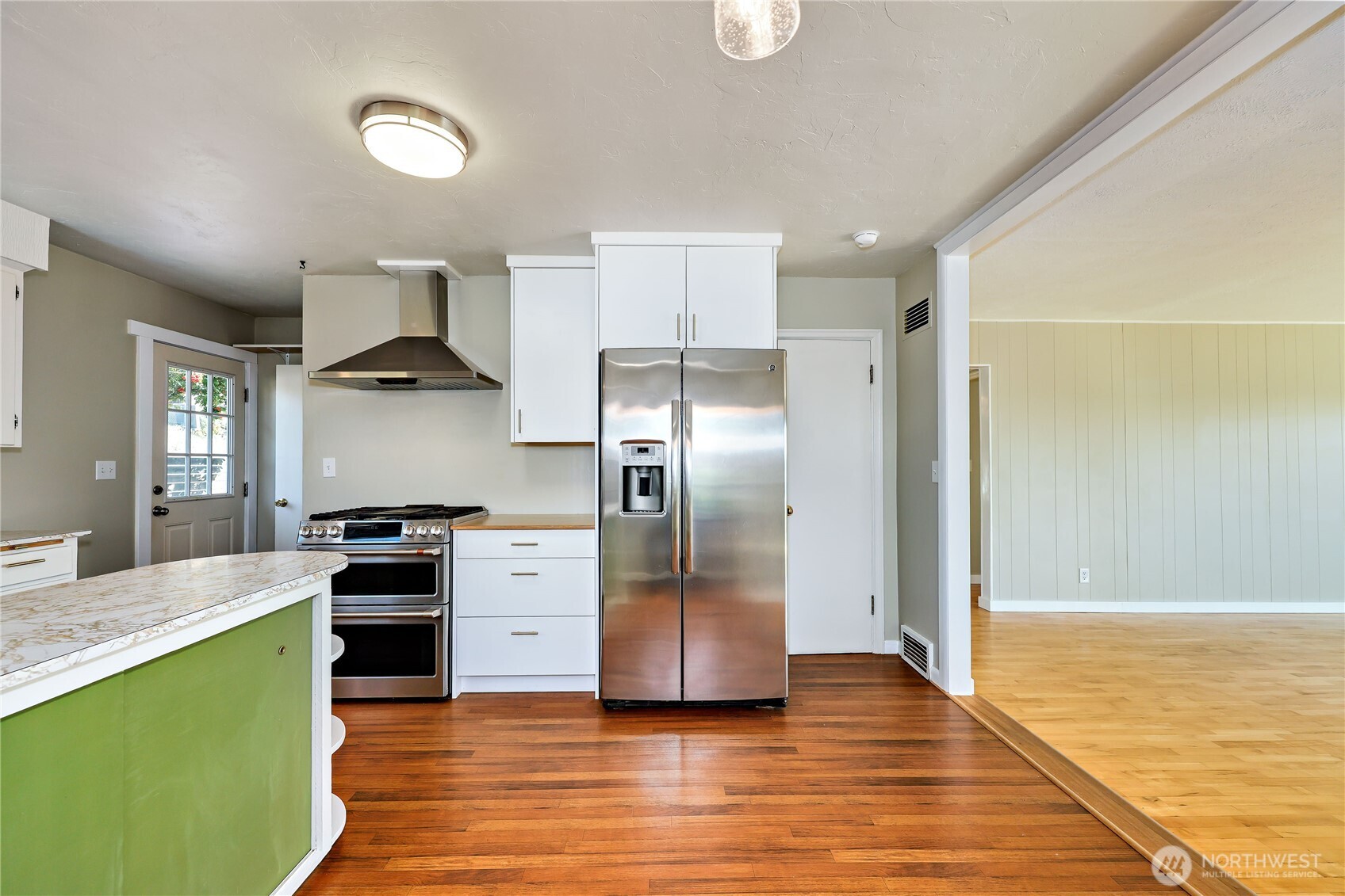 1518 Winfield Avenue Bremerton, WA 98310 - Photo 13 of 38 a kitchen with stainless steel appliances granite countertop a refrigerator a stove and a sink