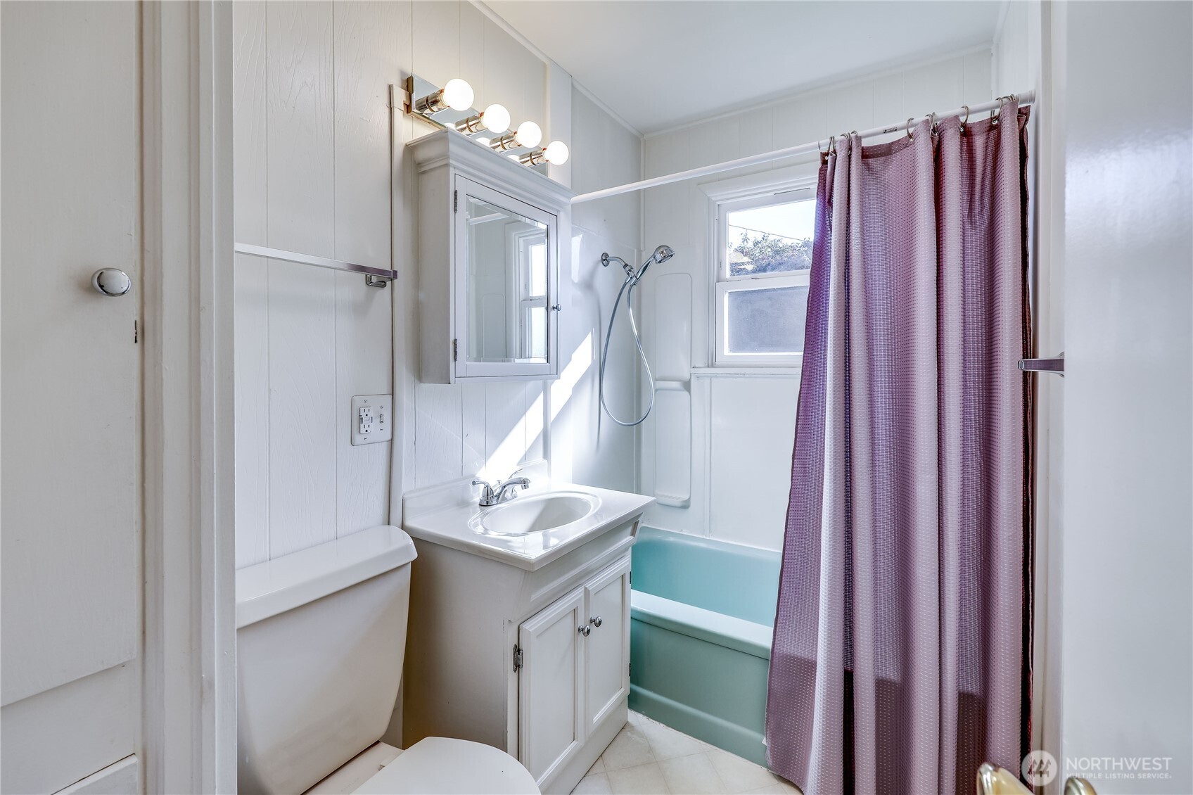 1518 Winfield Avenue Bremerton, WA 98310 - Photo 18 of 38 a bathroom with a sink a toilet and shower