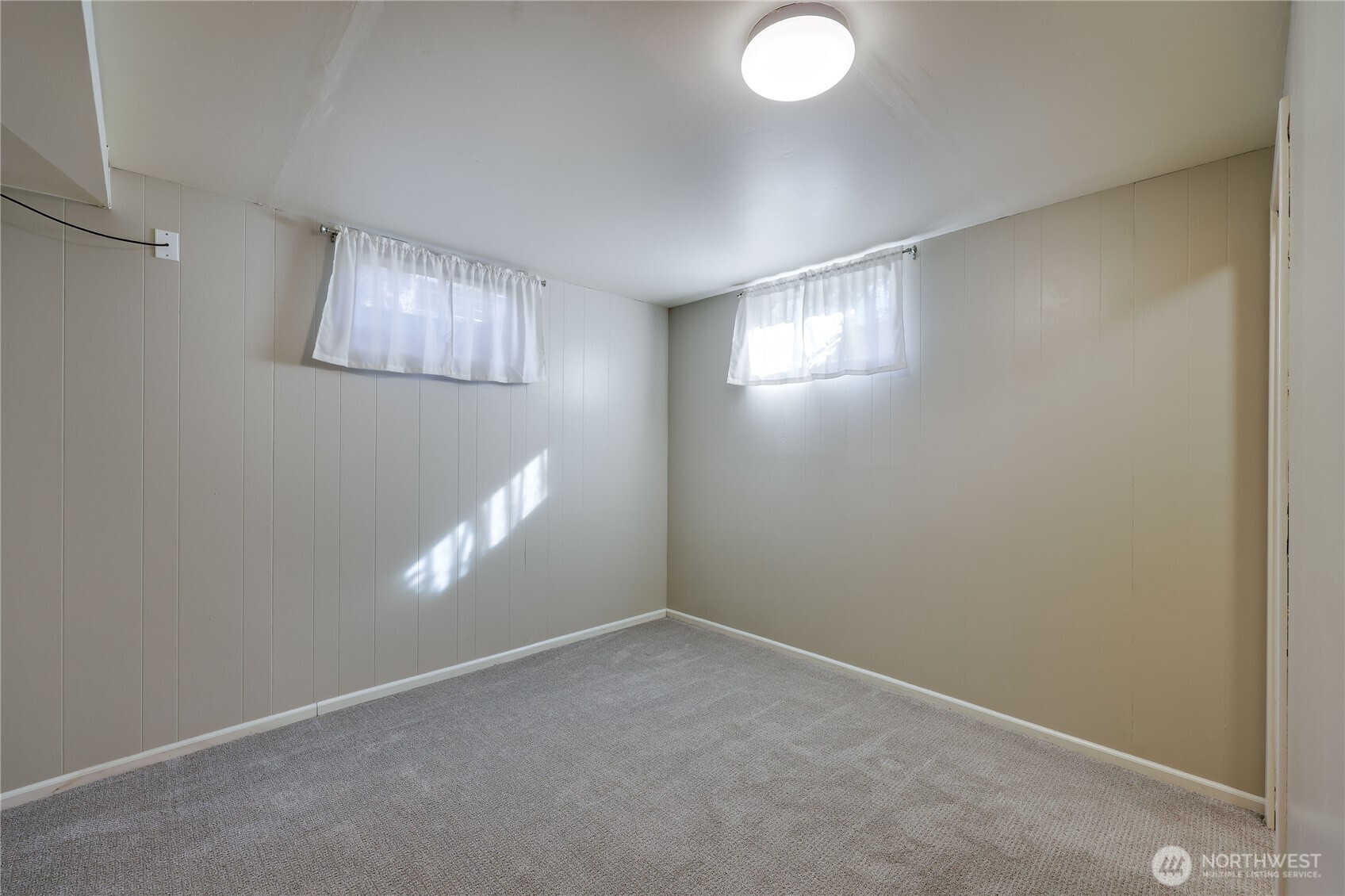 1518 Winfield Avenue Bremerton, WA 98310 - Photo 26 of 38 an empty room with windows and closet